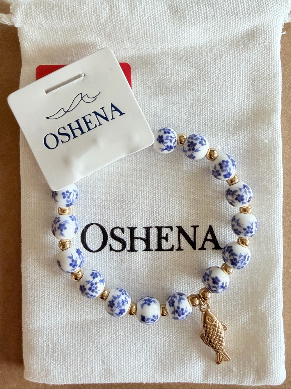 OSHENA PORTO AZUL BRACELET - Blue & White Floral Bead Bracelet with Charm